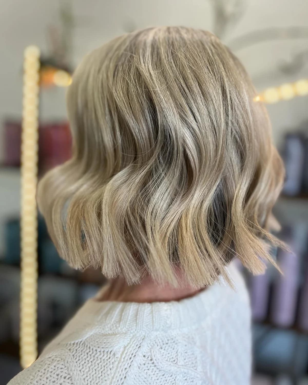 Soft beige blonde waves with a clean, even finish